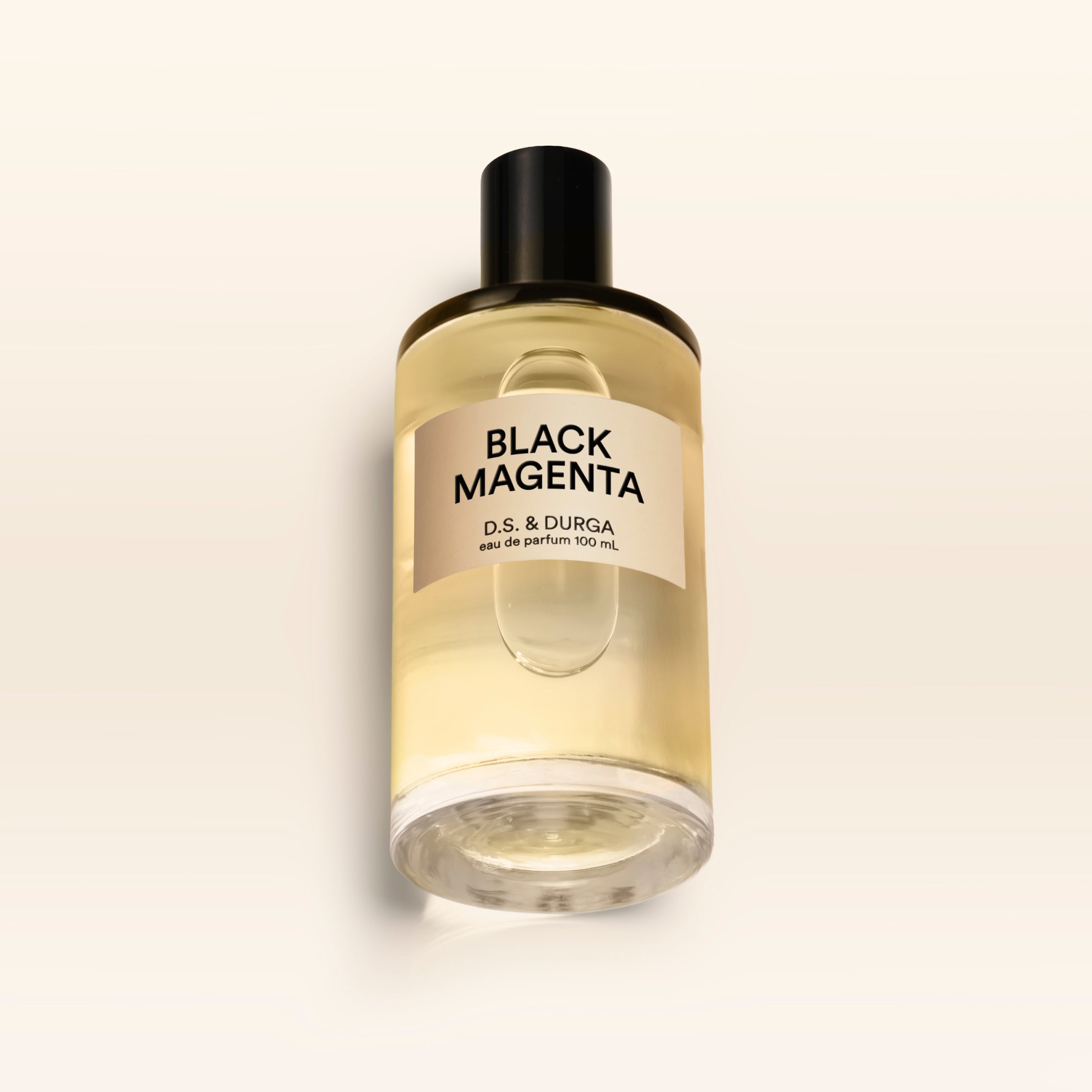 A 100 mL bottle of Black Magenta perfume.