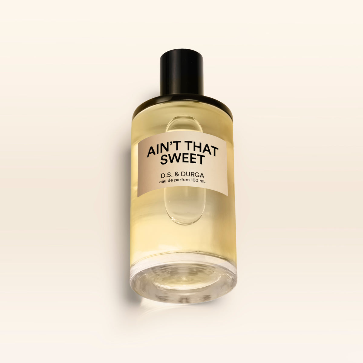 A 100 mL bottle of Ain't That Sweet perfume