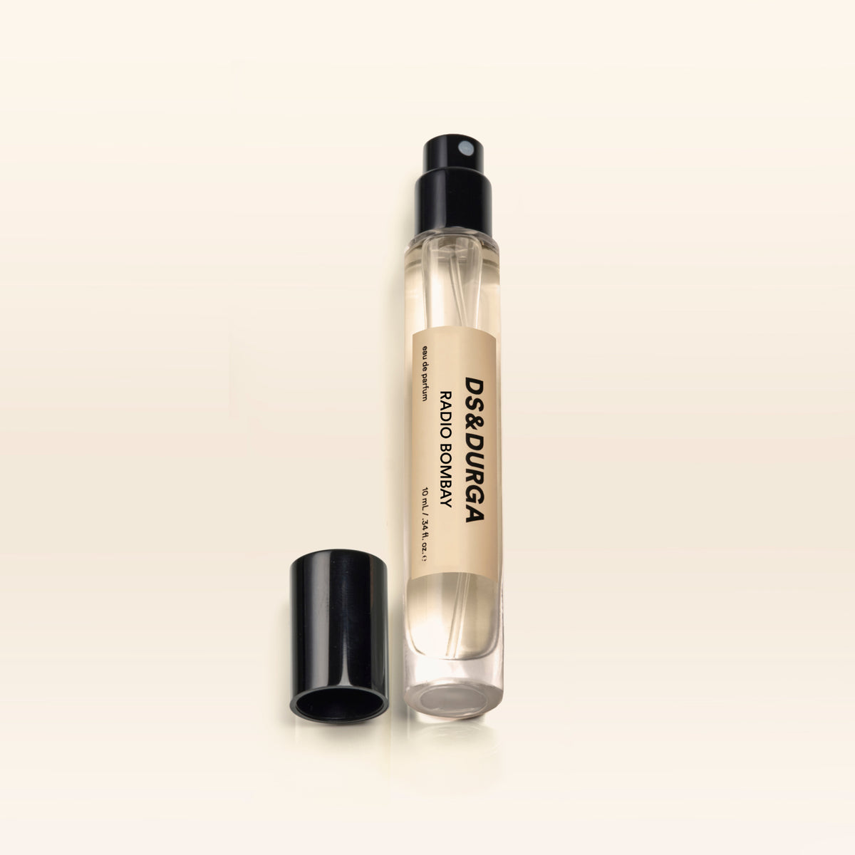 A travel size bottle of Radio Bombay perfume